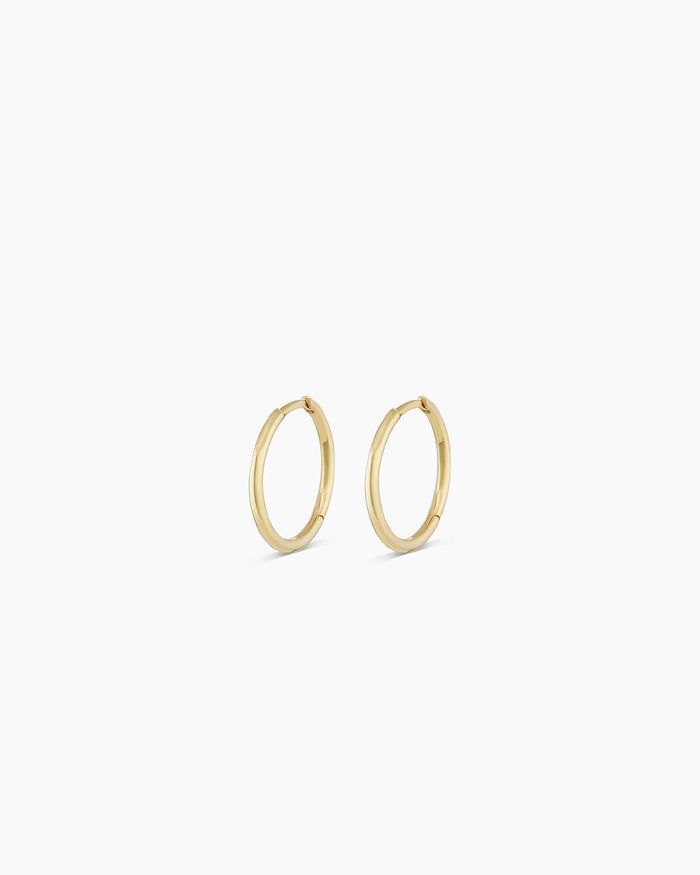 Woman wearing Classic Gold Huggie || option::14K Solid Gold, 11mm