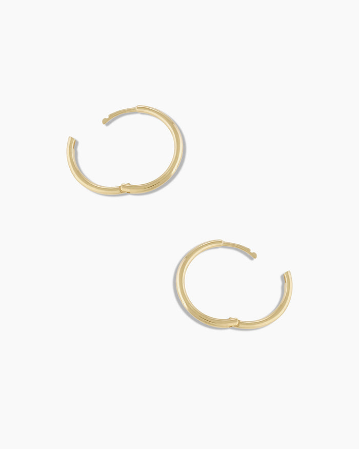 Woman wearing Classic Gold Huggie || option::14K Solid Gold, 11mm