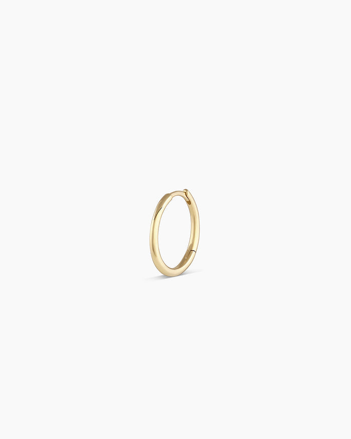 Woman wearing Classic Gold Huggie || option::14K Solid Gold, 13mm