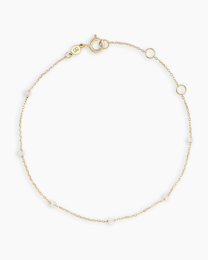 14K Solid Gold / White Topaz - April