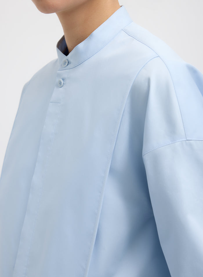 Chambray Blue Eco Poplin Tuxedo Shirt With Bib Flap - closeup of button details
