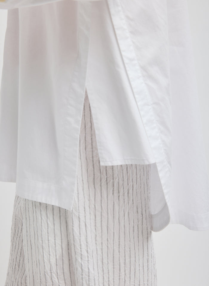 White Gabe Oversized Shirt - closeup of side slit detail