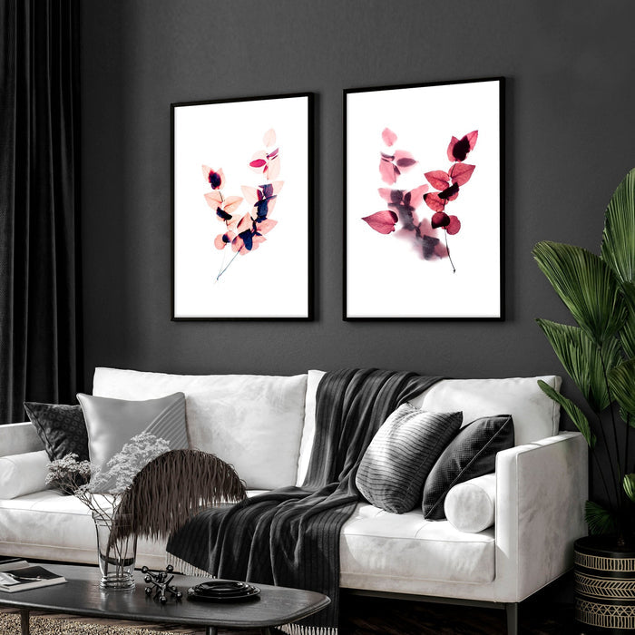 Contemporary living room with two framed floral pictures hanging above a white sofa against grey wall