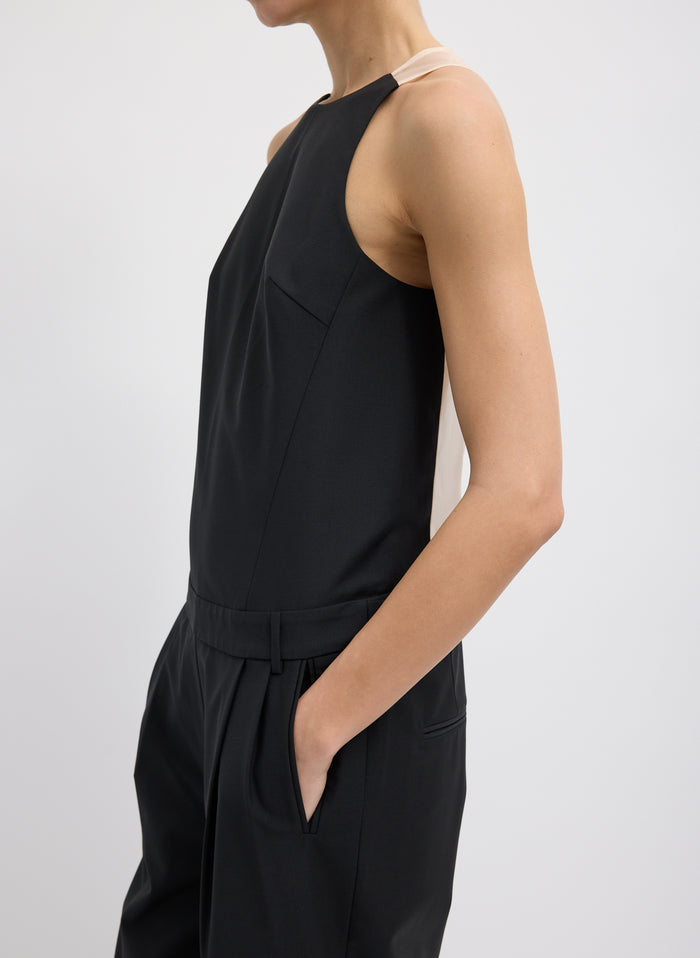 Black Recycled Tropical Wool Jumpsuit - closeup of side view on model