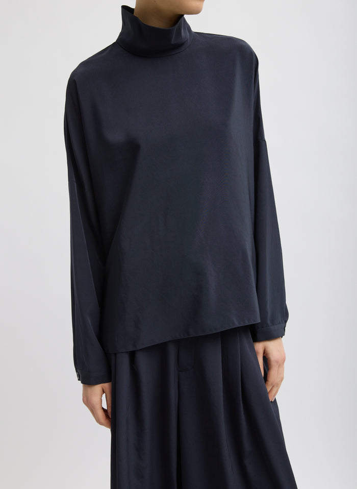Navy Relaxed Suiting Funnel Neck Dolman Sleeve Top - front view on model