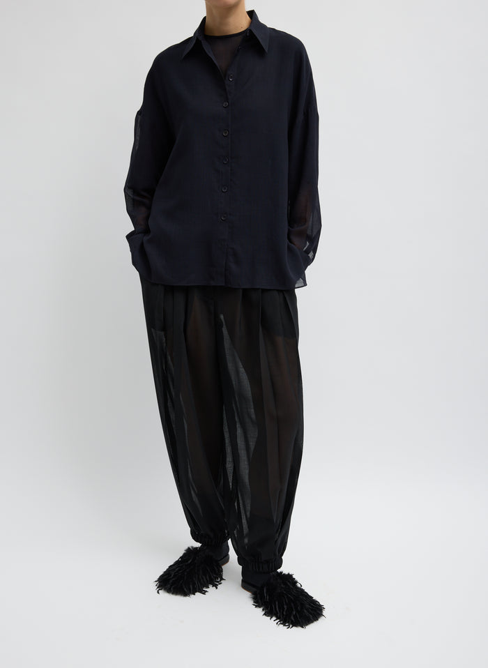 Black Sheer Wool Gauze Pleated Balloon Pant – relaxed fit, front view on model