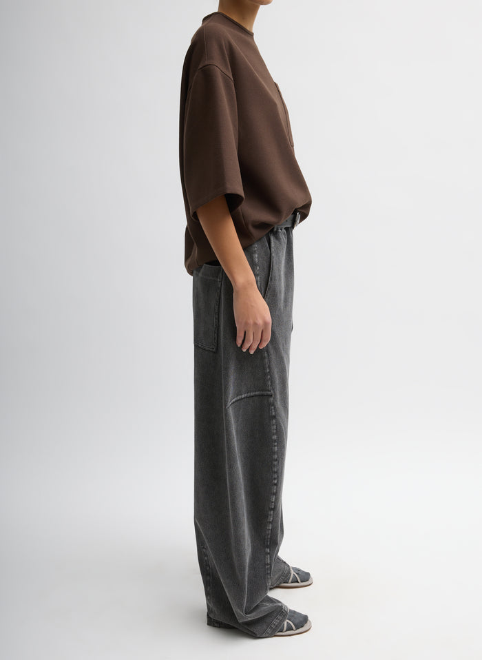 Black Stretch Denim Knit Winslow Pant - full look, side view on model