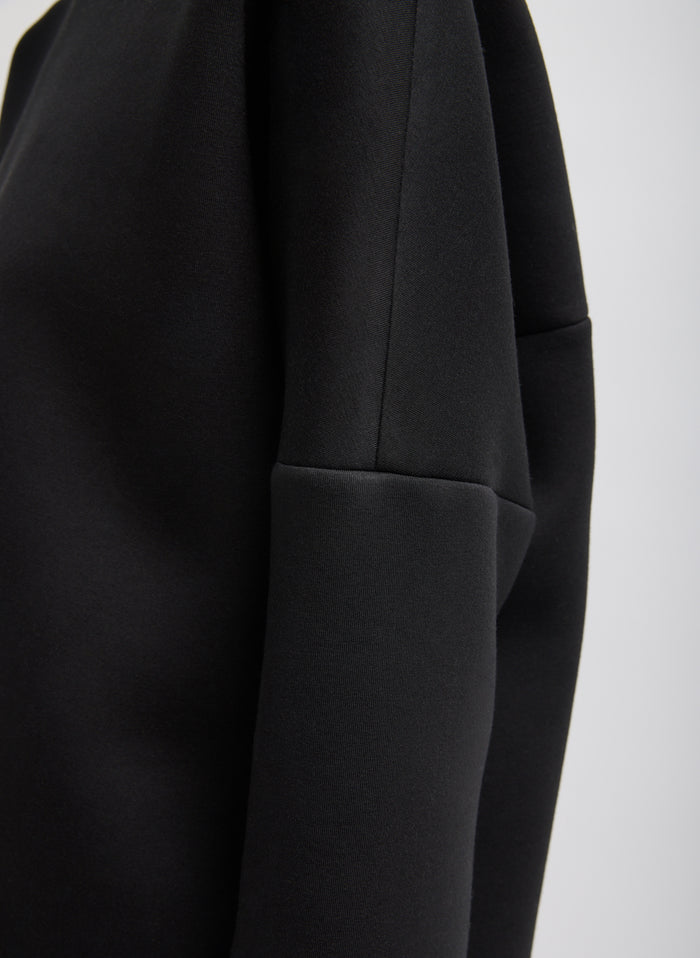 Black Structured Viscose Neck Dolman Sleeve Top - closeup of stitch detail at sleeve
